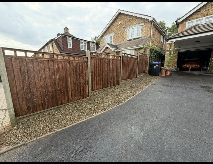 Driveway fencing and gravel project by Cartwright Fencing Company