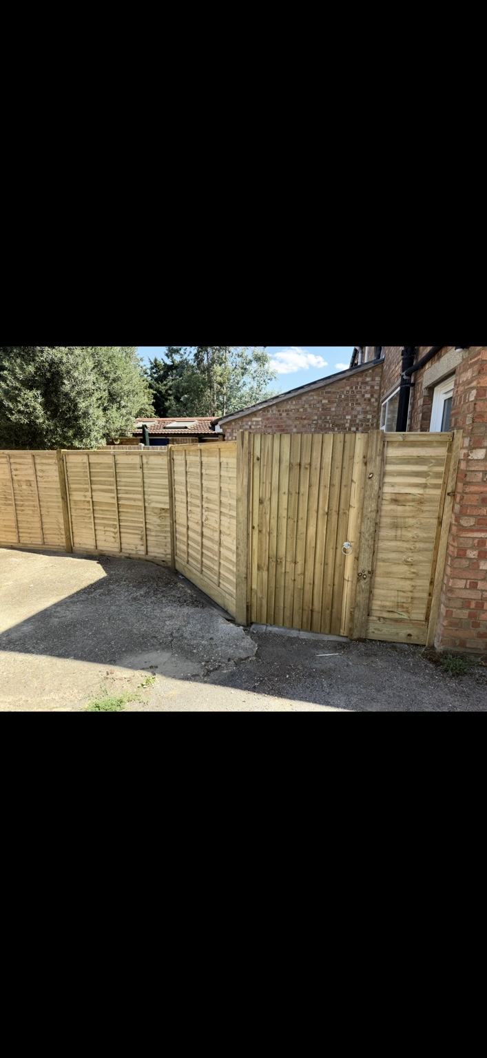 Timber panel fencing and gate project by Cartwright Fencing Company