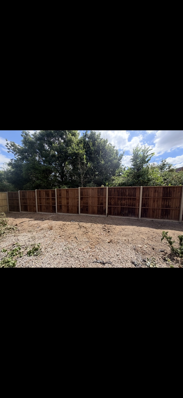 Timber panel fencing with concrete posts by Cartwright Fencing Company