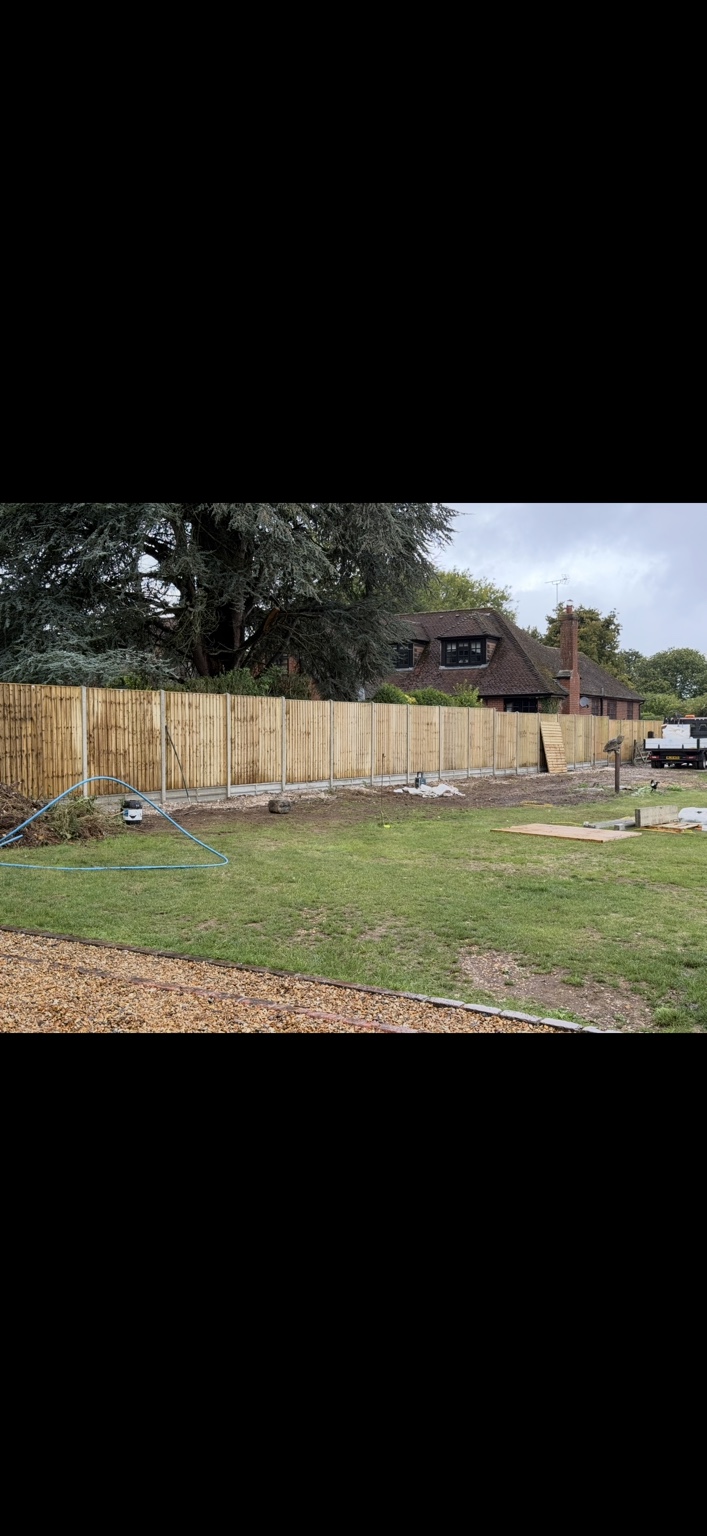 Timber panel fencing with concrete posts by Cartwright Fencing Company