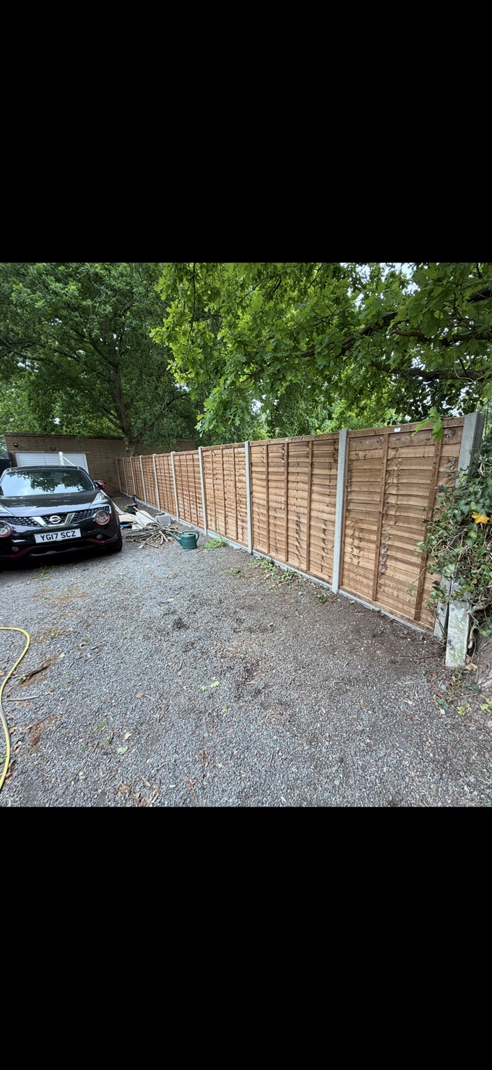 Timber panel fencing with concrete posts by Cartwright Fencing Company