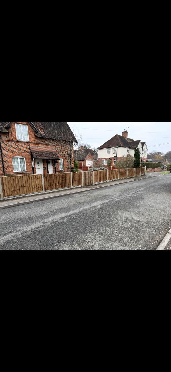 Roadside timber panel fencing by Cartwright Fencing Company